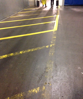 Rust-Oleum striped line one month after application, still bright and crisp
