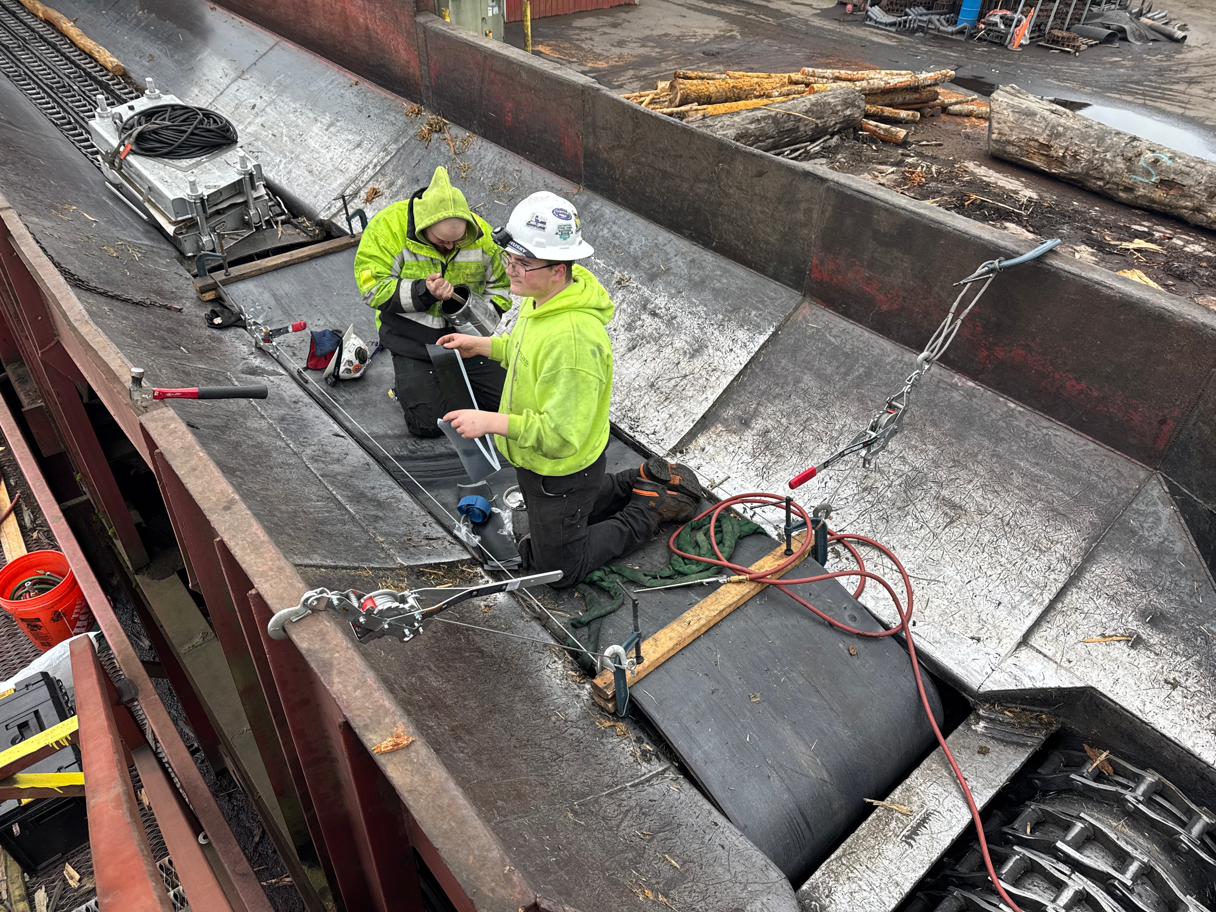 Technician diagnosing industrial equipment