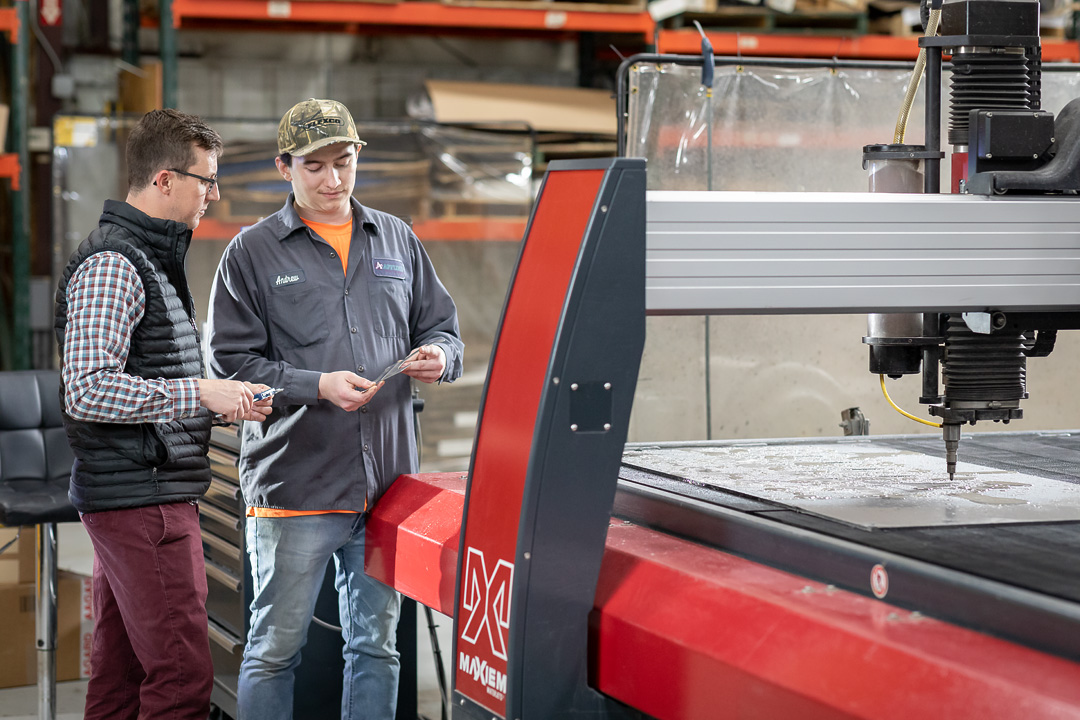 Applied specialists reviewing fluid power work