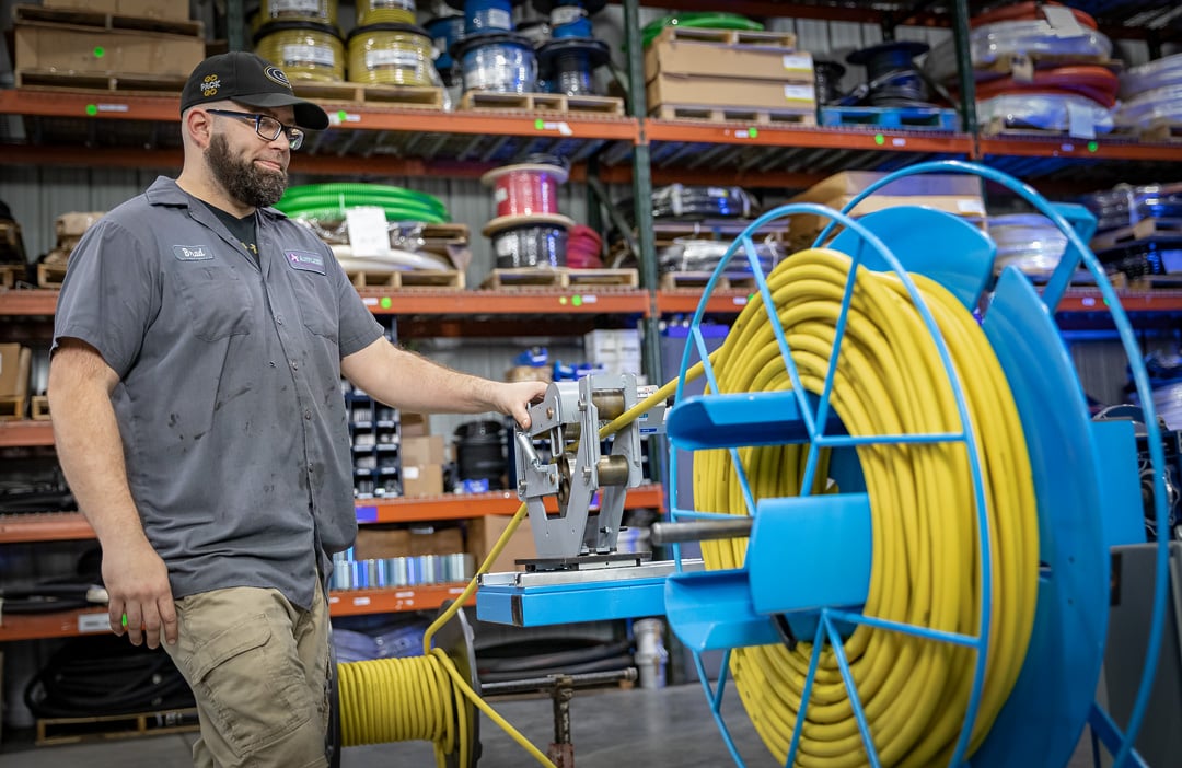 Hose technician fabricating a replacement assembly at the Appleton shop