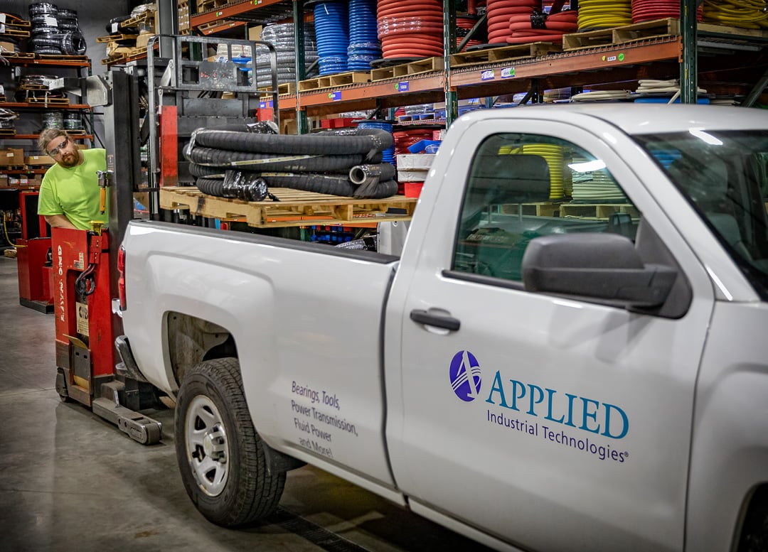 Crimping a hydraulic hose assembly at the Appleton shop