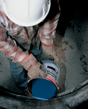 Crusher backing compound being placed in equipment