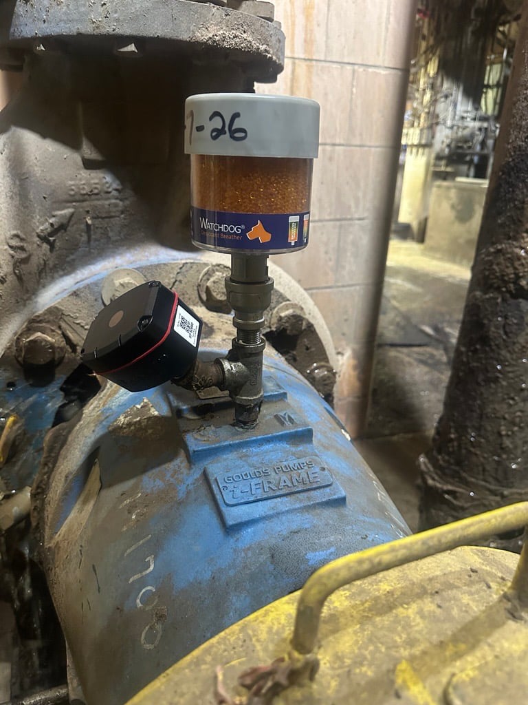 Trico Machine Vitals sensor installed on a centrifugal pump with desiccant breather